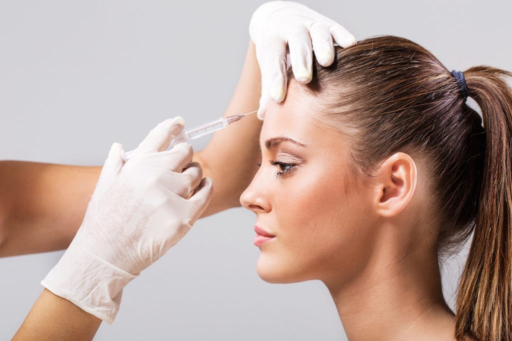 woman receiving botox injection