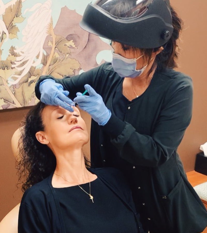 Karen administering Botox injections on a patient at Ziba Medical Spa in Eugene, OR