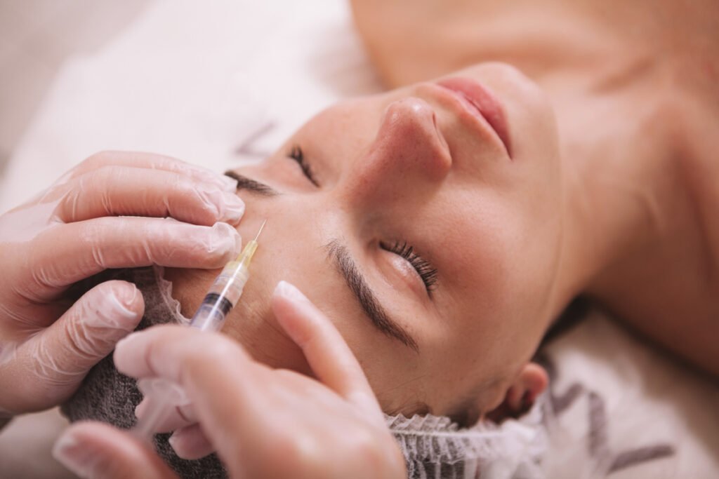 Woman getting Botox Cosmetic in her forehead for the first time