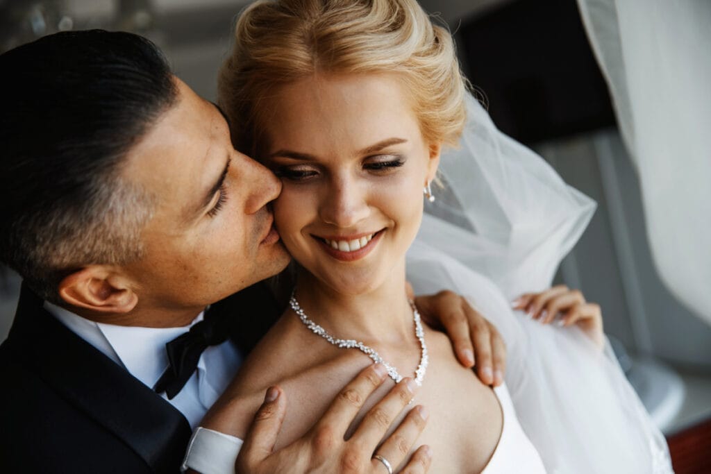 Happy smiling bride and groom on their wedding day